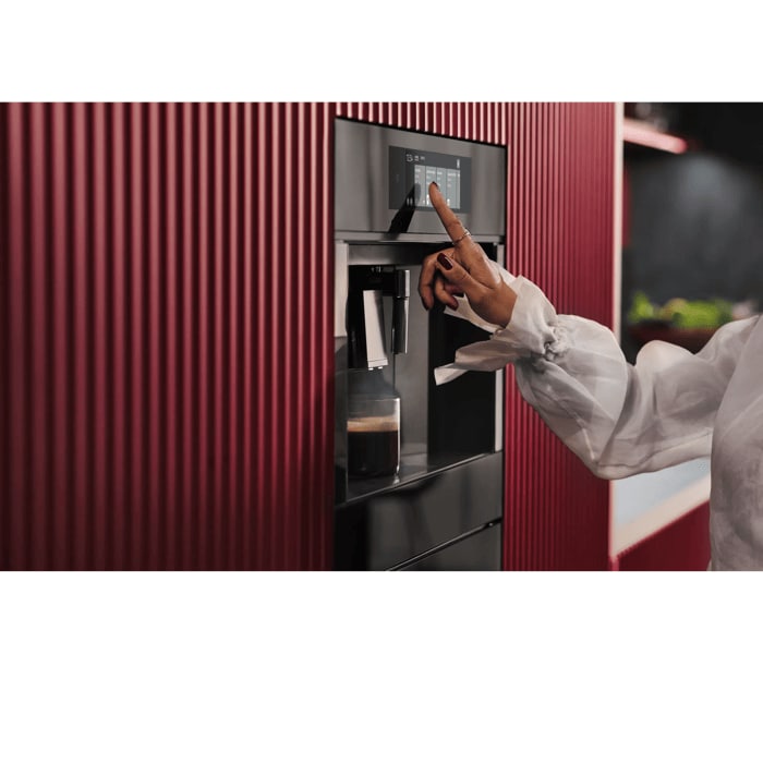 Built-in coffee machine designed to fit flush with kitchen cabinetry for a streamlined look.