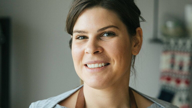 Jacques la Merde mosolyog