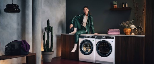 Woman sitting on counter with TD and WM
