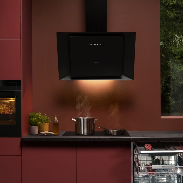 Kitchen with hob and hood